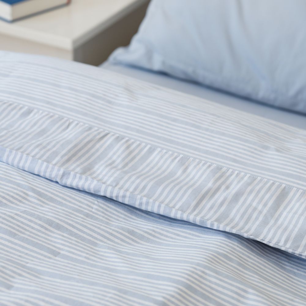 Woven with long-lasting durability in mind, this high-quality percale duvet cover is not only smooth to the touch but also consciously crafted for comfort and peace of mind.
