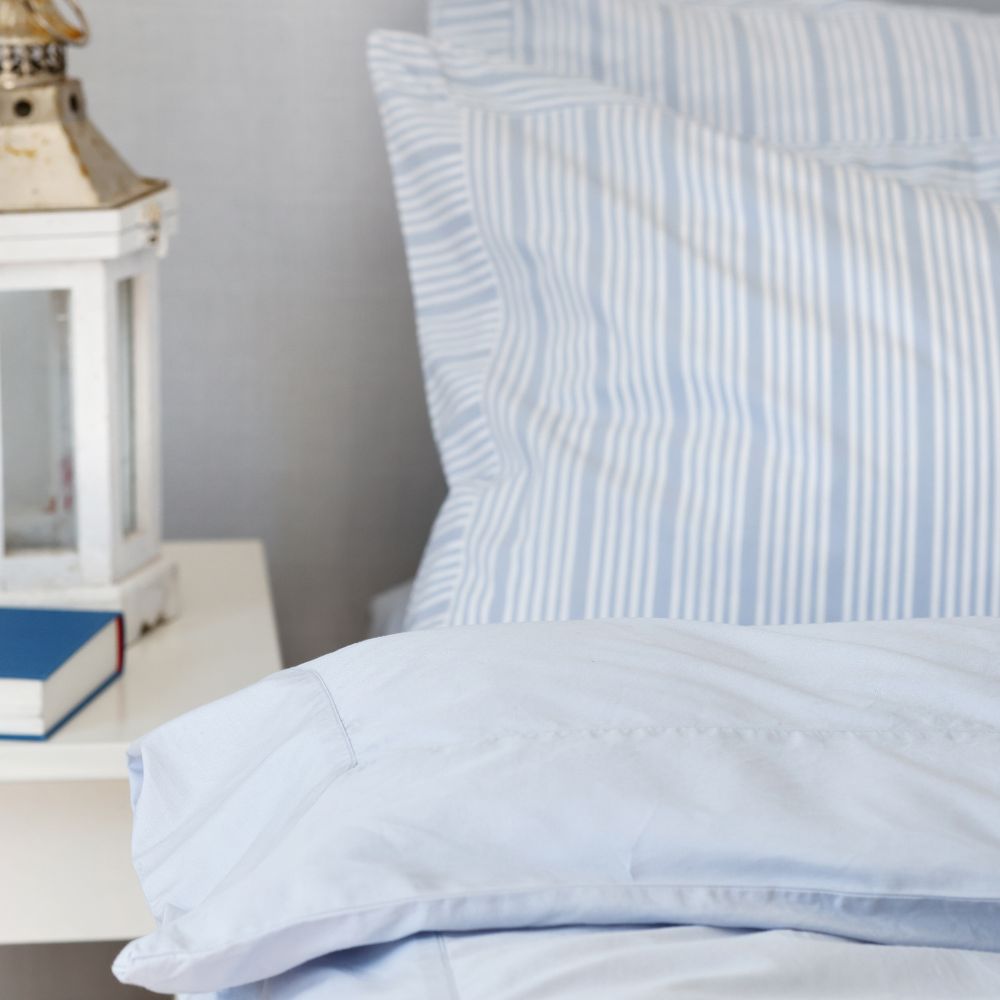 Powder Blue bedsheet with powder blue striped pillow case 